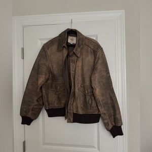Worn in leather jacket
